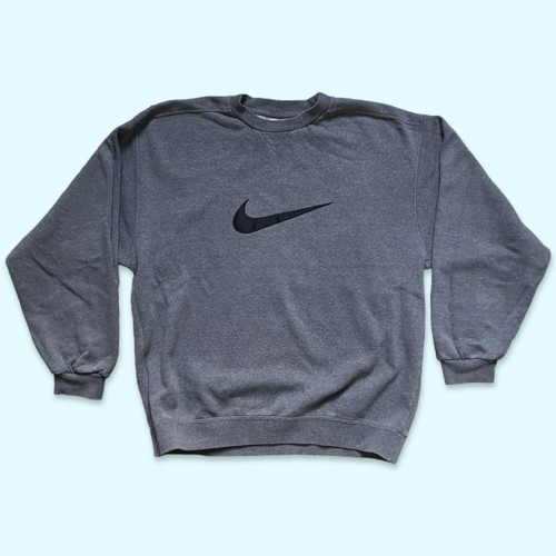 Nike spell out big - out, swoosh